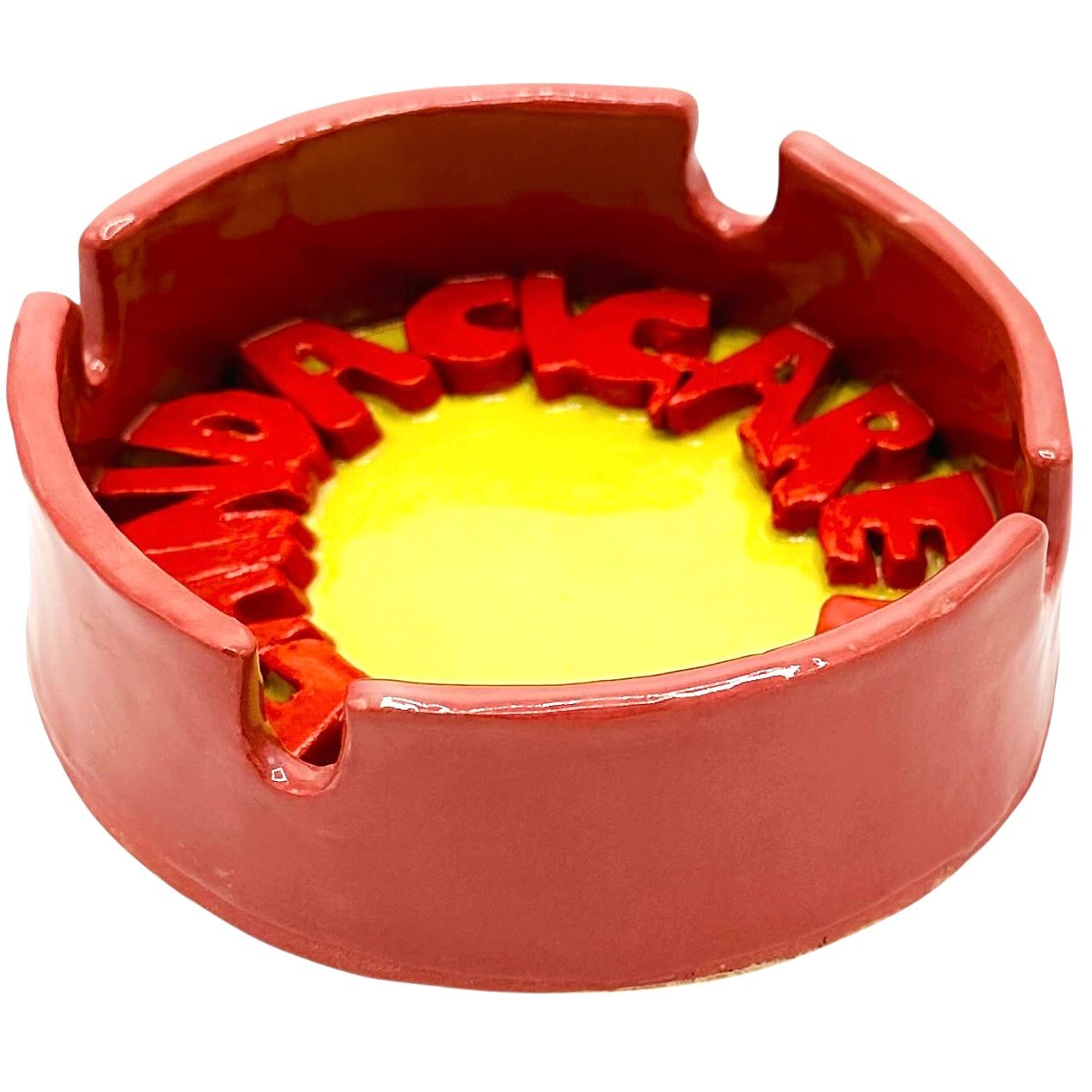 Behind A Cigarette Ashtray