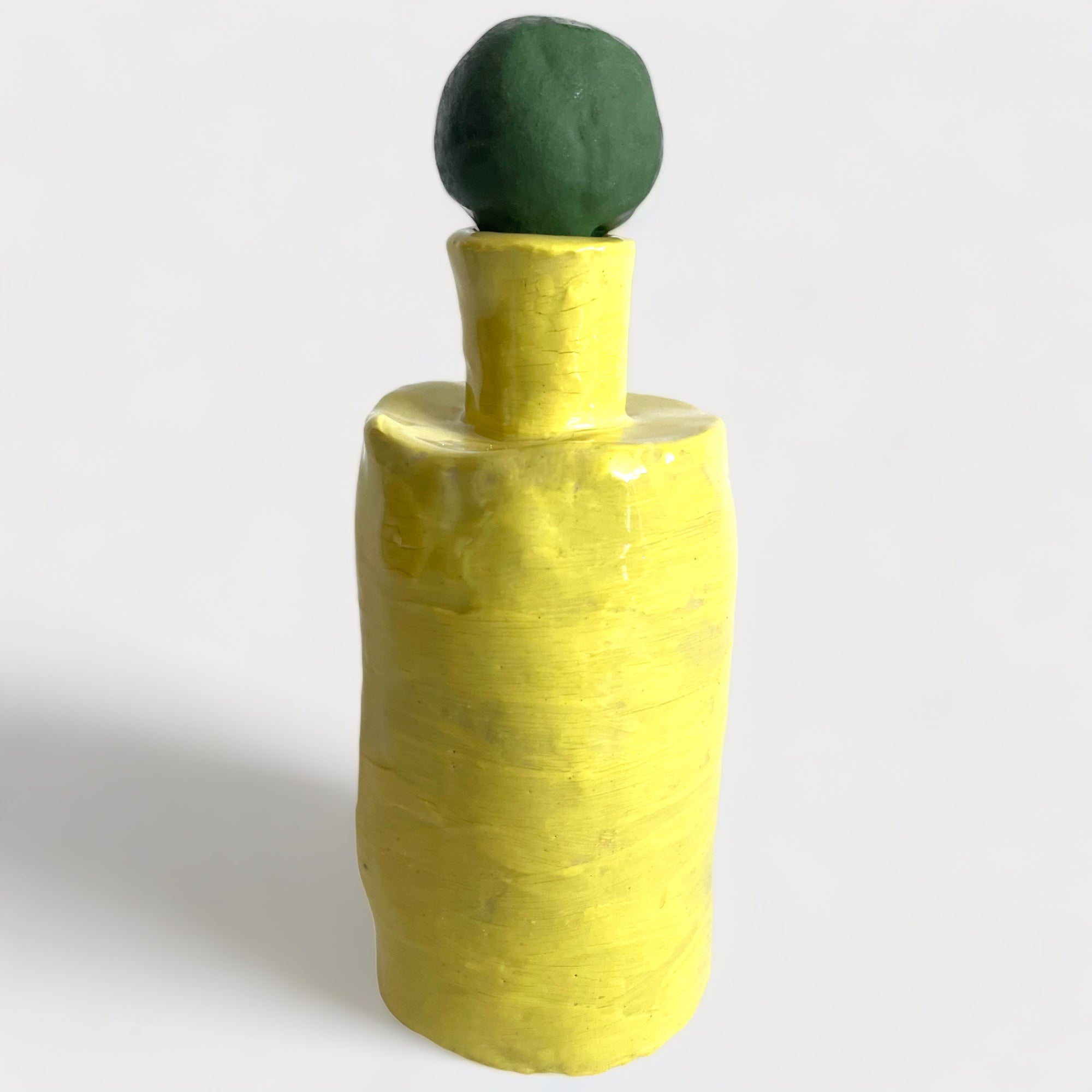 Yellow and Dark Green Bottle